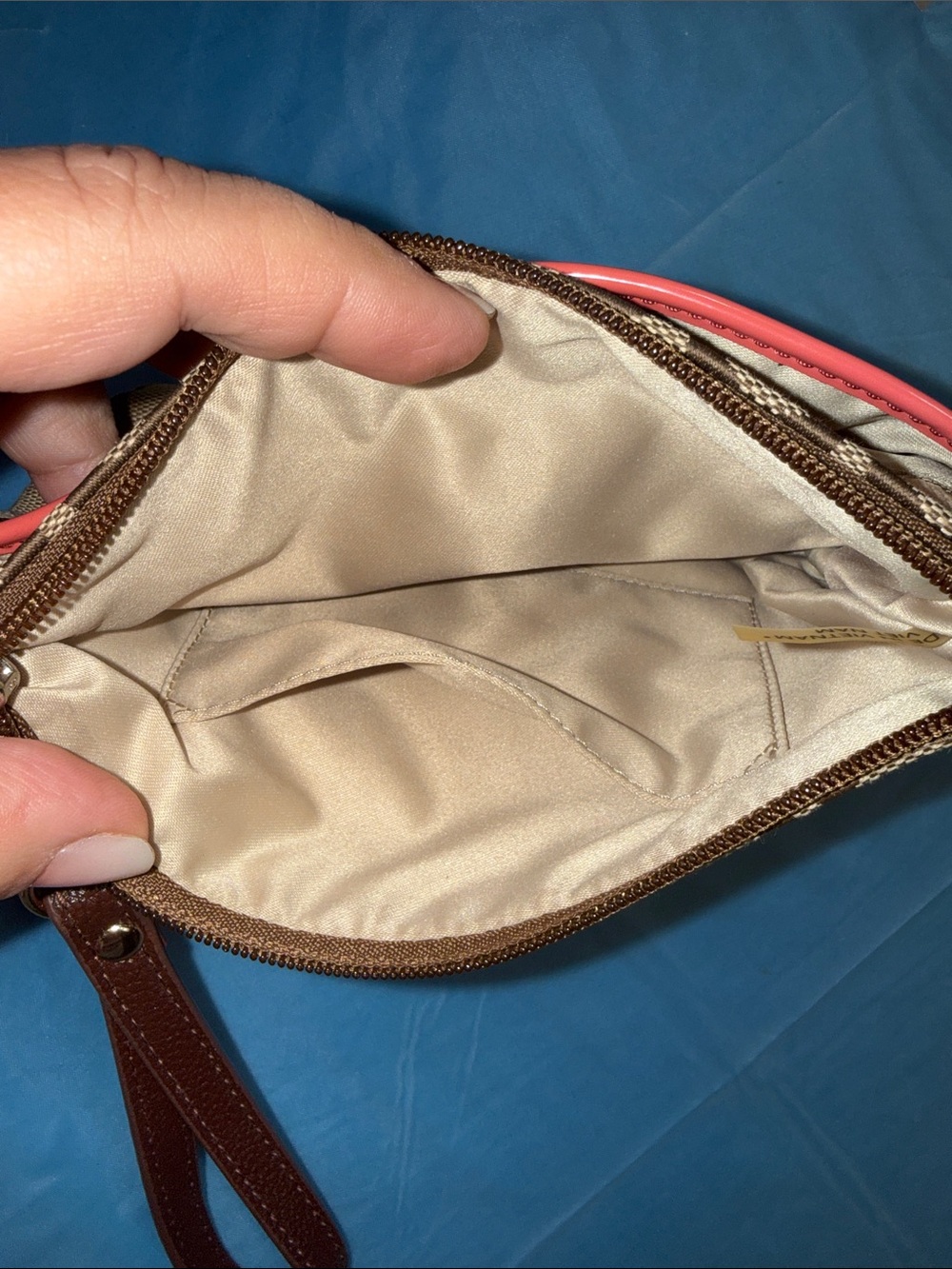 Coach Tan Signature Wristlet with Brown Trim and Coral Accent and key charm - Picture 5 of 6
